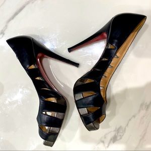 Black Louboutin pumps